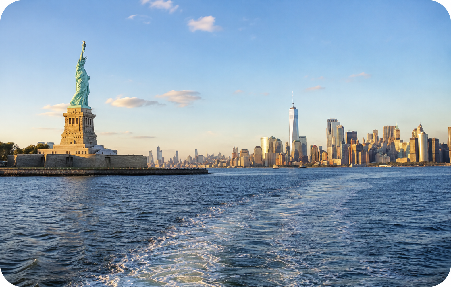 Statue of Liberty and Manhattan skyline across New York Harbor